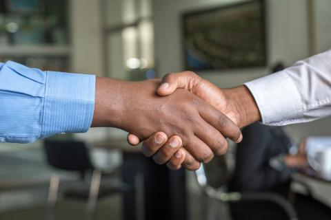Picture of two people shaking hands